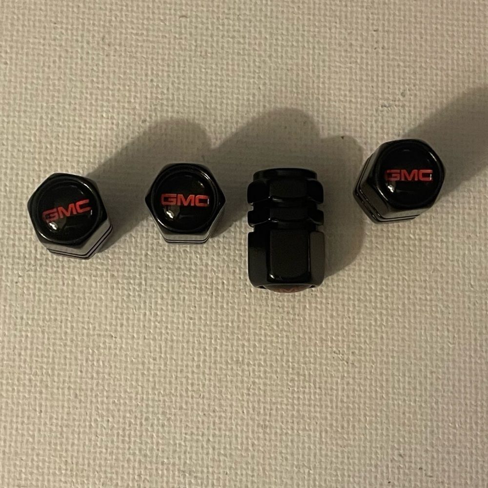 GMC Logo valve Stem caps in Black set of 4 NWT